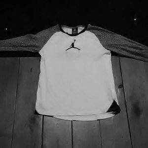 A black grey and white air Jordan shirt